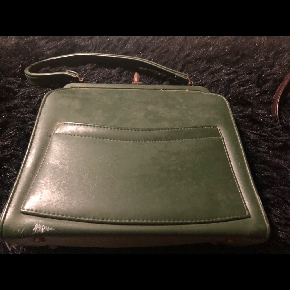 Vintage handbag from the 50s. Not as in good of shape as my other one. Needs TLC